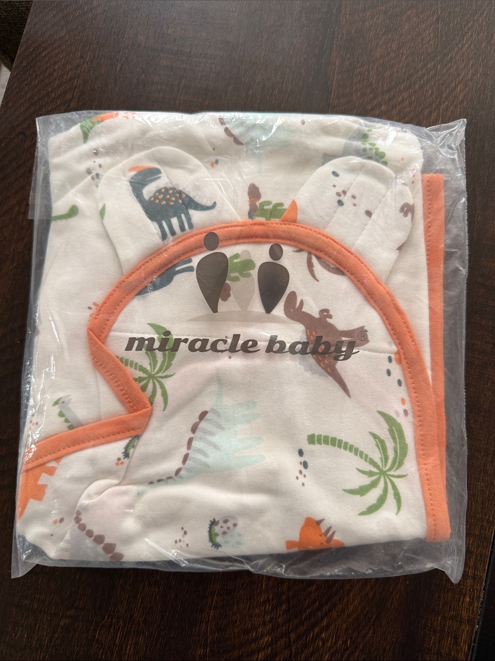 Miracle Baby White  Swaddle with Orange Trim and Dino Print